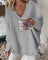 Sweater with long-sleeved design, crossed embroidery and V-neckline-2