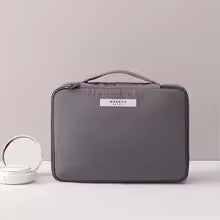 Spacious waterproof makeup and toiletry organizer with travel design