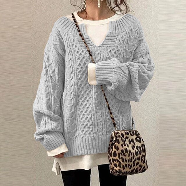 https://cdn.shopify.com/s/files/1/0826/7982/4718/files/elle-vire-eleganter-strickpullover-newberlin-mode-54322155716934.jpg?v=1715934772