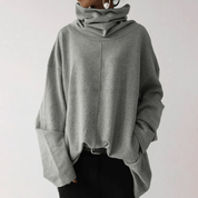 https://cdn.shopify.com/s/files/1/0826/7982/4718/files/elle-vire-stylischer-und-schicker-pullover-in-ubergrosse-newberlin-mode-54326279831878.png?v=1715943908