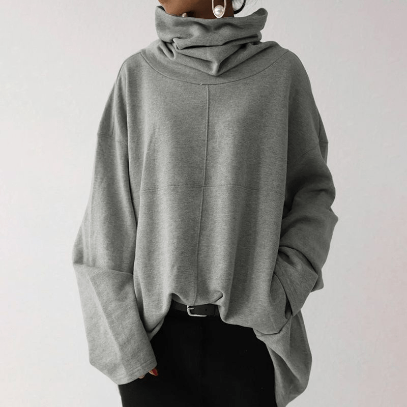 https://cdn.shopify.com/s/files/1/0826/7982/4718/files/elle-vire-stylischer-und-schicker-pullover-in-ubergrosse-newberlin-mode-54326279831878.png?v=1715943908