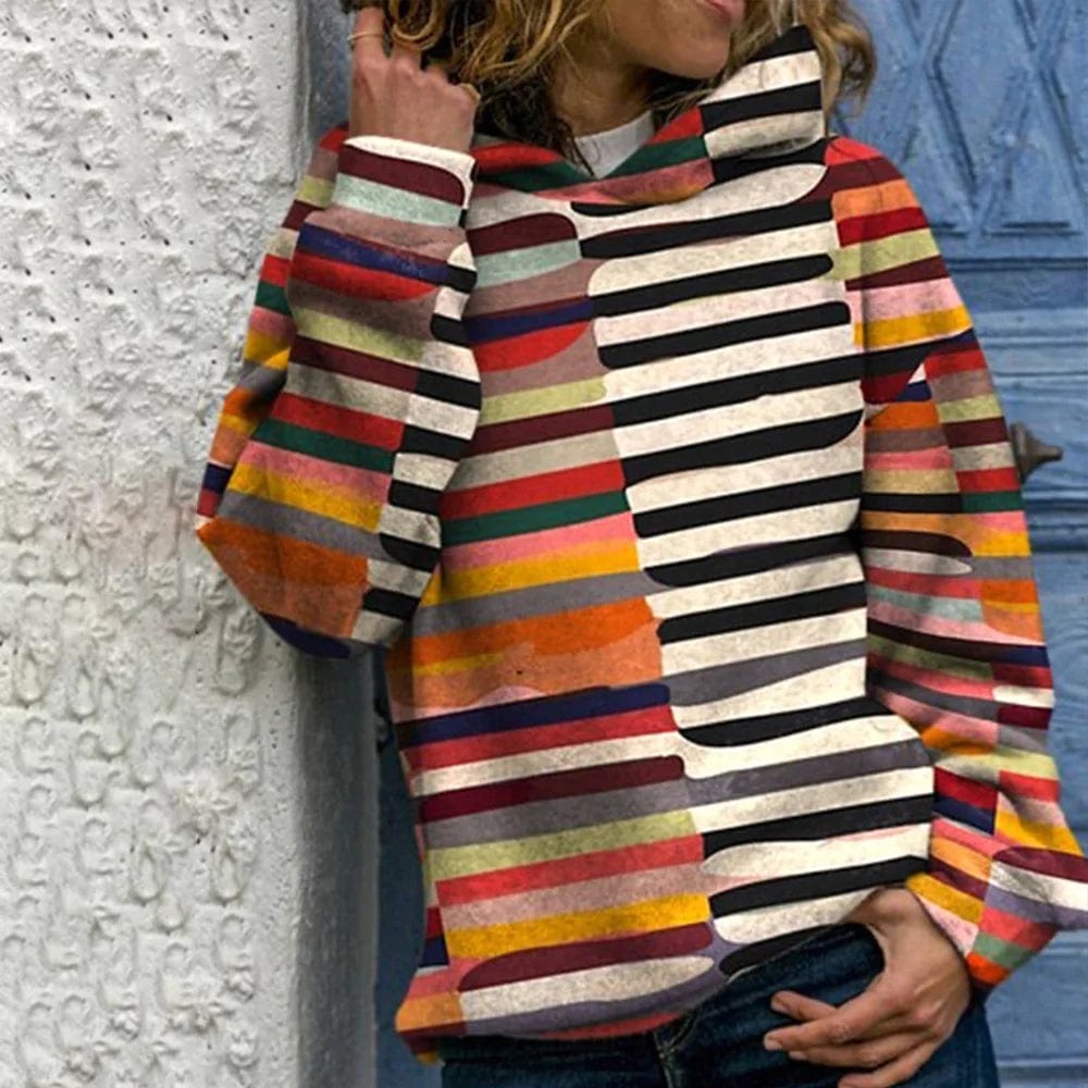 https://cdn.shopify.com/s/files/1/0826/7982/4718/files/eva-janssen-mehrfarbiger-kapuzenpullover-newberlin-mode-54321182572870.jpg?v=1715849986