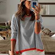 Sweaters in blue with orange -colored edge and striped pattern-3